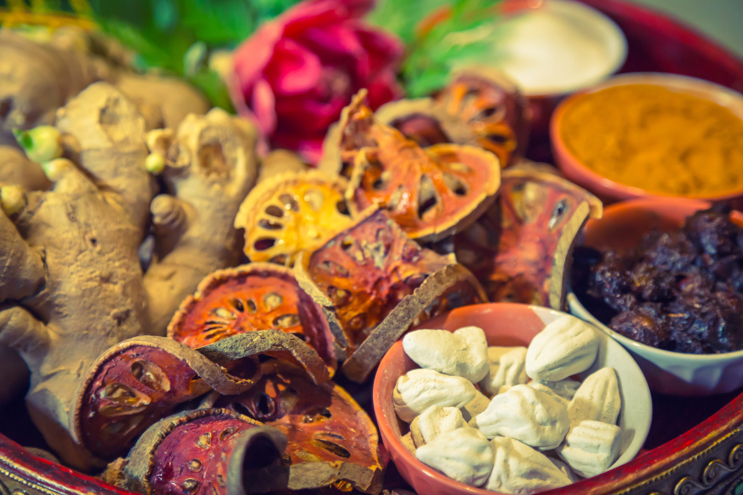 Grinding fresh spice blends at a spice shop